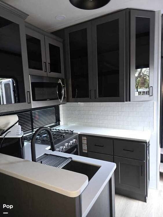 2024 Skyline Alliance 44V14 - Used Toy Hauler For Sale by Pop RVs in Mulberry, Florida features Slideout, Awning, Air Conditioning