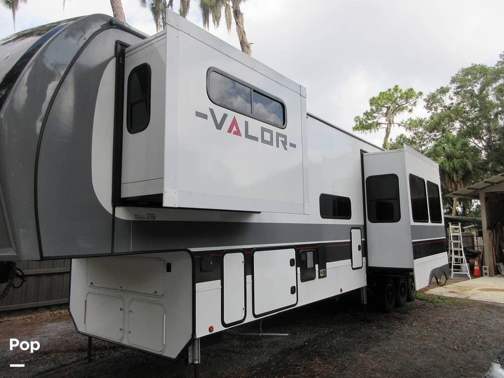 2024 Alliance RV Valor 44V14 - Used Toy Hauler For Sale by Pop RVs in Mulberry, Florida features Generator, Slideout, Air Conditioning, Leveling Jacks, Awning
