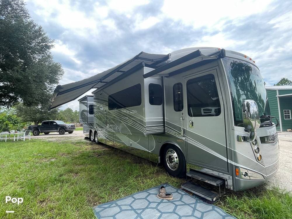 2016 Winnebago Ellipse Ultra 42QL - Used Diesel Pusher For Sale by Pop RVs in Venus, Florida features Air Conditioning, Awning, Slideout, Leveling Jacks, Generator