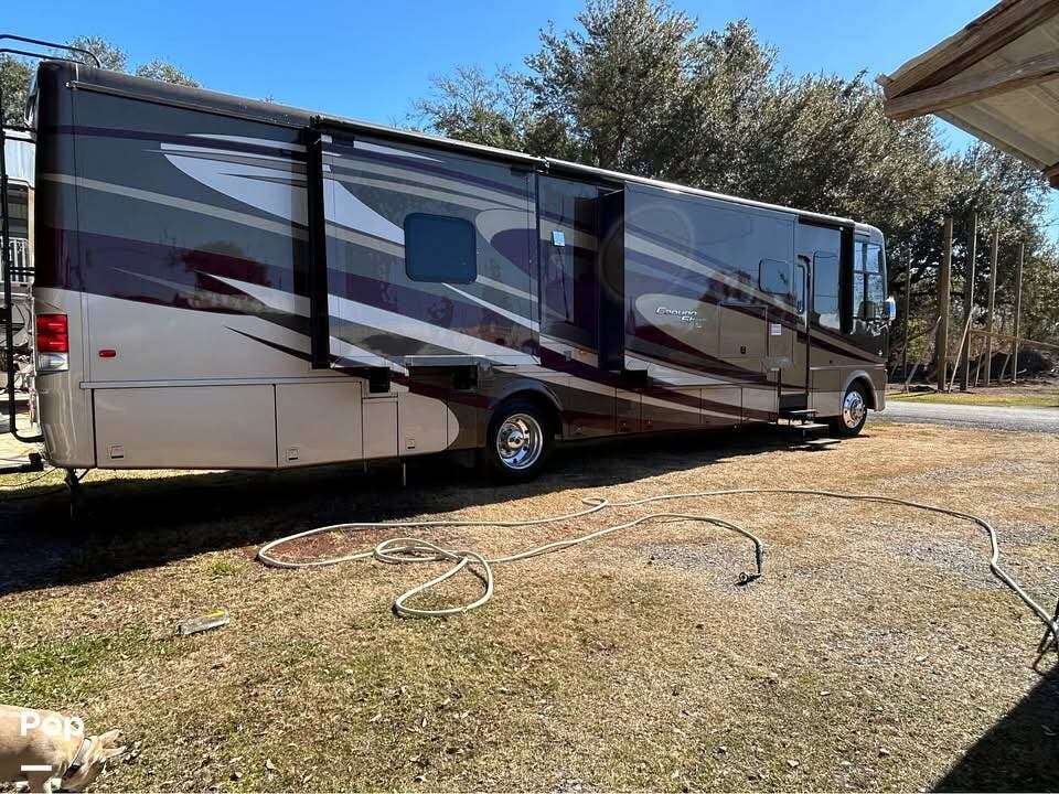 2015 Newmar Canyon Star 3953 - Used Class A For Sale by Pop RVs in Galliano, Louisiana features Leveling Jacks, Generator, Awning, Slideout, Air Conditioning