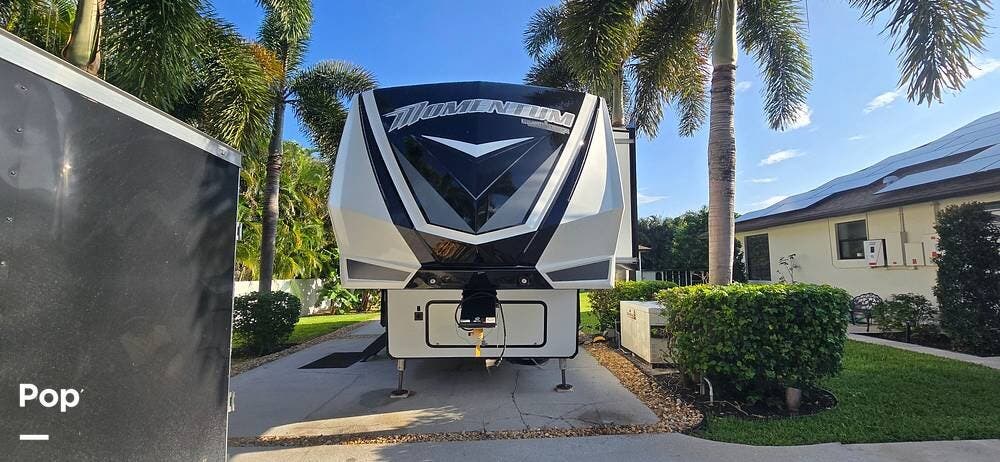 2020 Grand Design Momentum 351M - Used Toy Hauler For Sale by Pop RVs in Loxahatchee, Florida features Awning, Generator, Air Conditioning, Slideout