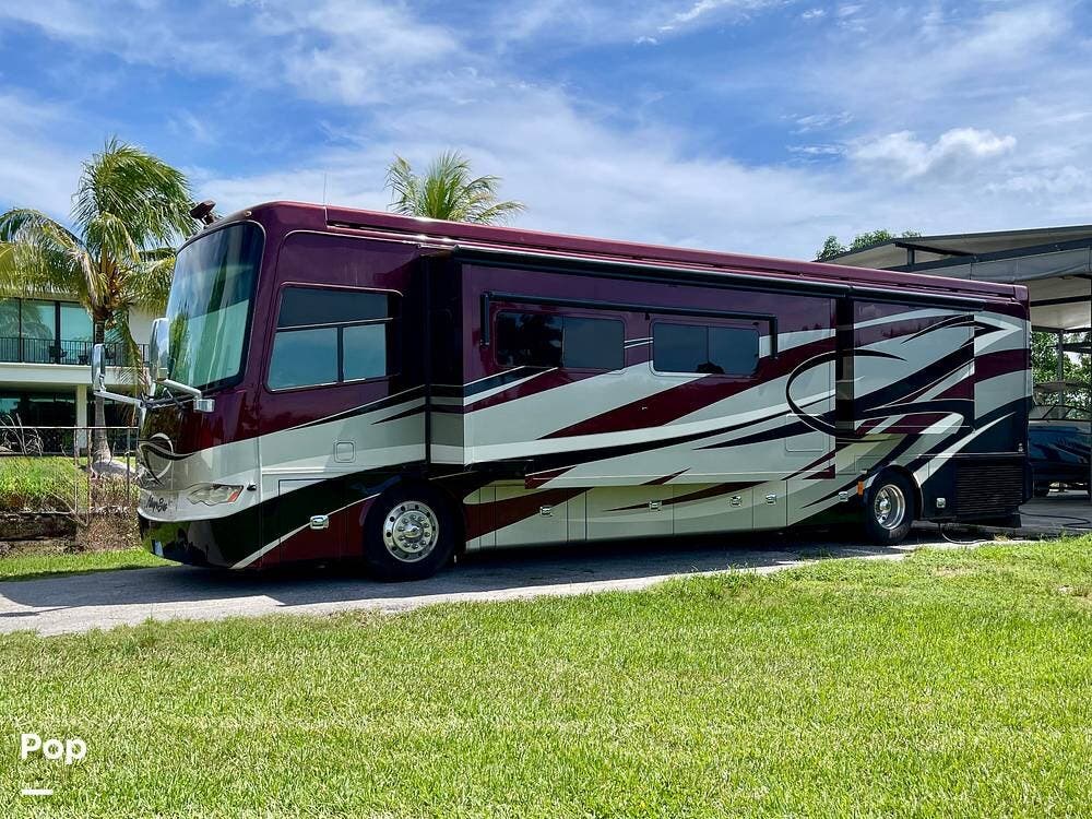 2013 Tiffin Allegro Bus 40QBP - Used Diesel Pusher For Sale by Pop RVs in Miami, Florida features Leveling Jacks, Air Conditioning, Slideout, Awning, Generator