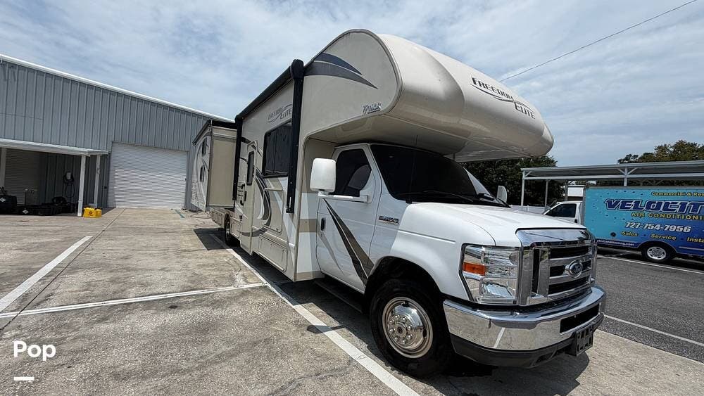 2019 Thor Motor Coach Freedom Elite 30FE - Used Class C For Sale by Pop RVs in Clearwater, Florida features Awning, Slideout, Leveling Jacks, Air Conditioning, Generator