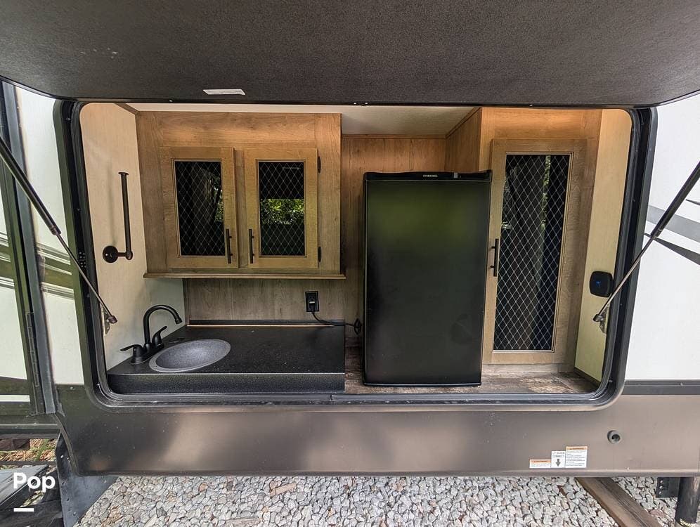 2021 Forest River Sabre 38DBQ - Used Fifth Wheel For Sale by Pop RVs in Sanford, Florida features Leveling Jacks, Awning, Slideout, Air Conditioning