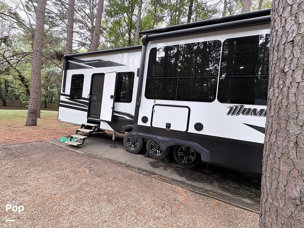 2024 Grand Design Momentum M-Class 395MS - Used Toy Hauler For Sale by Pop RVs in Rock Falls, Illinois features Air Conditioning, Leveling Jacks, Awning, Generator, Slideout