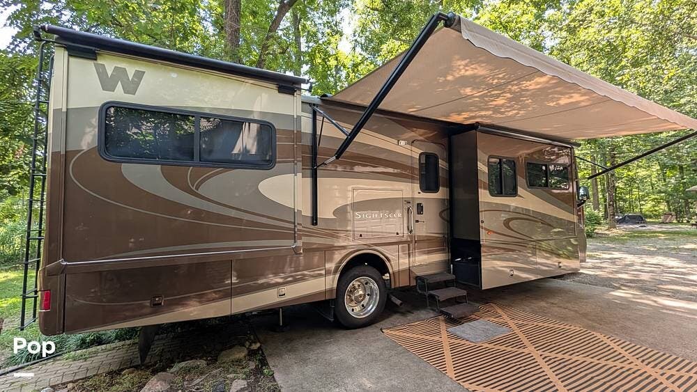 2013 Winnebago Sightseer 33C - Used Class C For Sale by Pop RVs in Sheridan, Indiana features Slideout, Awning, Leveling Jacks, Air Conditioning, Generator