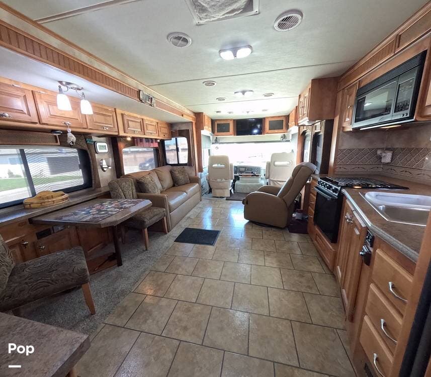 2010 Tiffin Allegro 34TGA - Used Diesel Pusher For Sale by Pop RVs in Artesia, California features Leveling Jacks, Generator, Slideout, Air Conditioning, Awning