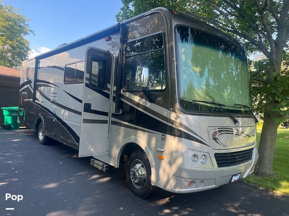 2013 Coachmen Mirada 29DS SE - Used Class A For Sale by Pop RVs in Lockport, New York features Slideout, Generator, Air Conditioning, Awning, Leveling Jacks