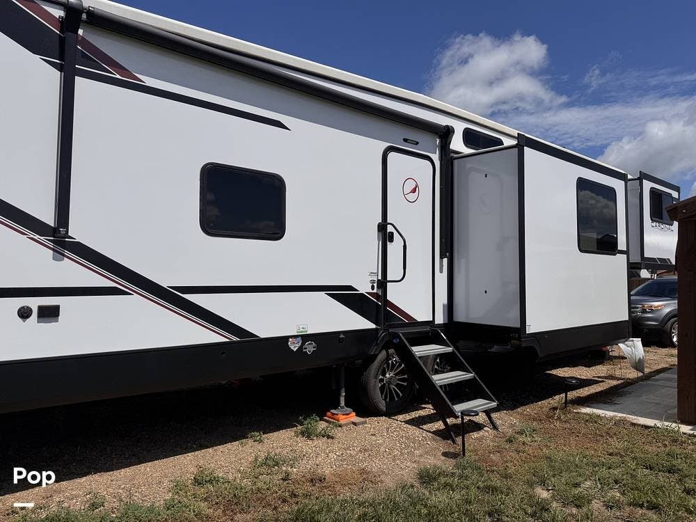 2024 Forest River Cardinal 35FL - Used Fifth Wheel For Sale by Pop RVs in Yankton, South Dakota features Slideout, Awning, Air Conditioning, Leveling Jacks