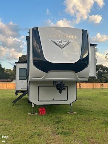 2022 Forest River Cedar Creek Champagne 38EL - Used Fifth Wheel For Sale by Pop RVs in Perry, Georgia features Slideout, Awning, Air Conditioning, Leveling Jacks