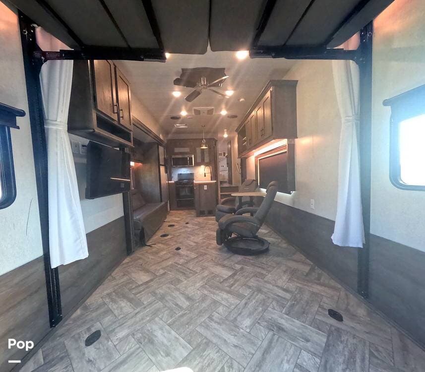 2022 Forest River Stealth 3217G - Used Toy Hauler For Sale by Pop RVs in Glendora, California features Awning, Leveling Jacks, Slideout, Generator, Air Conditioning