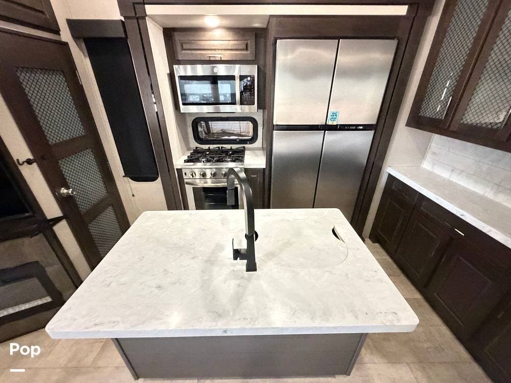 2021 Grand Design Momentum 397TH - Used Toy Hauler For Sale by Pop RVs in Kanab, Utah features Awning, Slideout, Air Conditioning, Generator