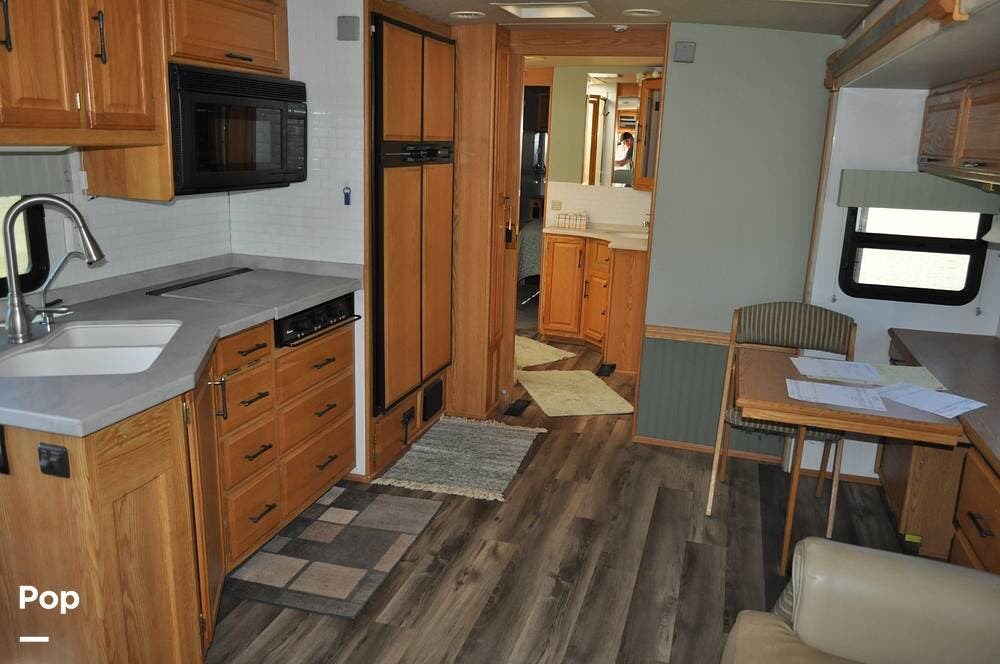2005 Winnebago Journey 36G - Used Diesel Pusher For Sale by Pop RVs in Golden Valley, Arizona features Leveling Jacks, Generator, Awning, Air Conditioning, Slideout