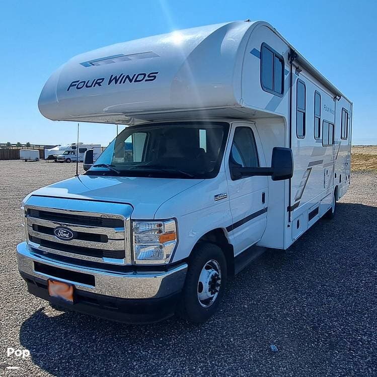 2027 Thor Motor Coach Four Winds 28Z - Used Class C For Sale by Pop RVs in Aurora, Colorado features Generator, Air Conditioning, Slideout, Awning