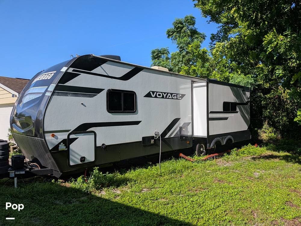 2023 Winnebago Voyage 3235RL - Used Travel Trailer For Sale by Pop RVs in Fort Myers, Florida features Air Conditioning, Slideout, Awning, Leveling Jacks