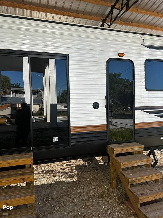 2024 Forest River Wildwood Lodge 44VIEW - Used Park Model For Sale by Pop RVs in Suwannee, Florida features Slideout, Leveling Jacks, Air Conditioning, Awning