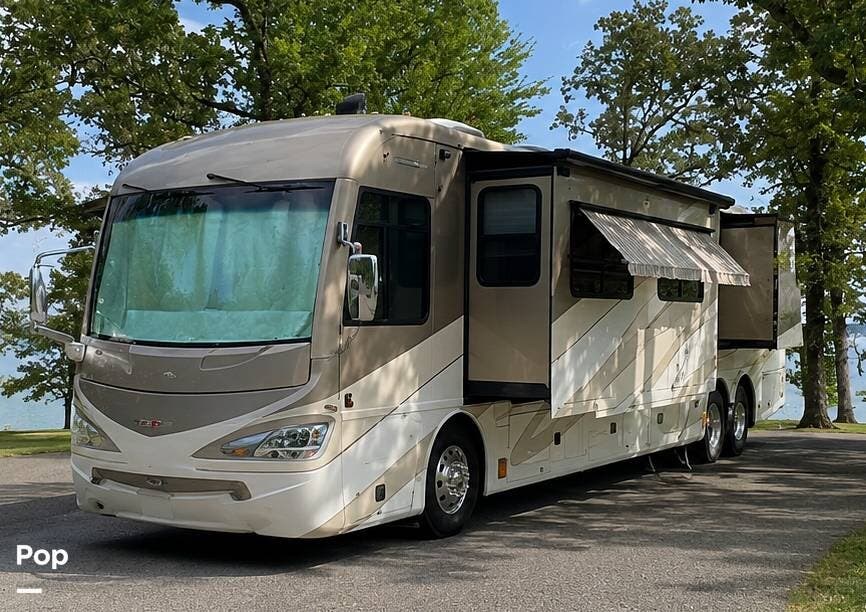 2008 Fleetwood Revolution LE 42N - Used Diesel Pusher For Sale by Pop RVs in Arkadelphia, Arkansas features Generator, Leveling Jacks, Slideout, Awning, Air Conditioning