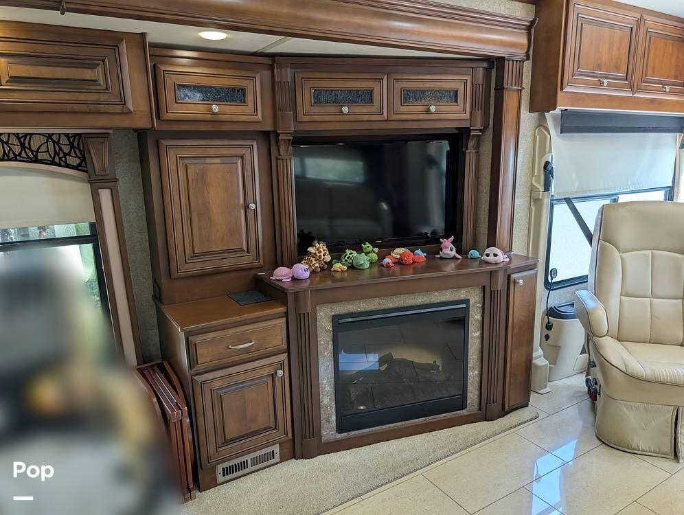 2013 Thor Motor Coach Tuscany 45LT - Used Diesel Pusher For Sale by Pop RVs in Orlando, Florida features Awning, Slideout, Leveling Jacks, Generator, Air Conditioning