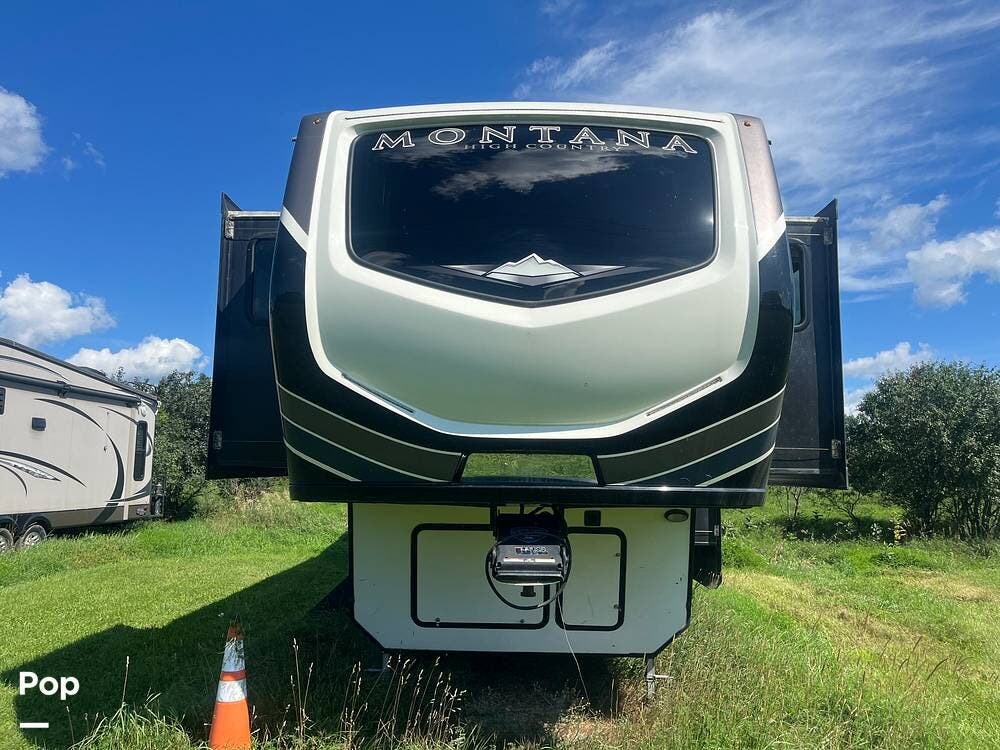 2021 Keystone Montana High Country 377FL - Used Fifth Wheel For Sale by Pop RVs in Leroy, New York features Air Conditioning, Awning, Leveling Jacks, Slideout