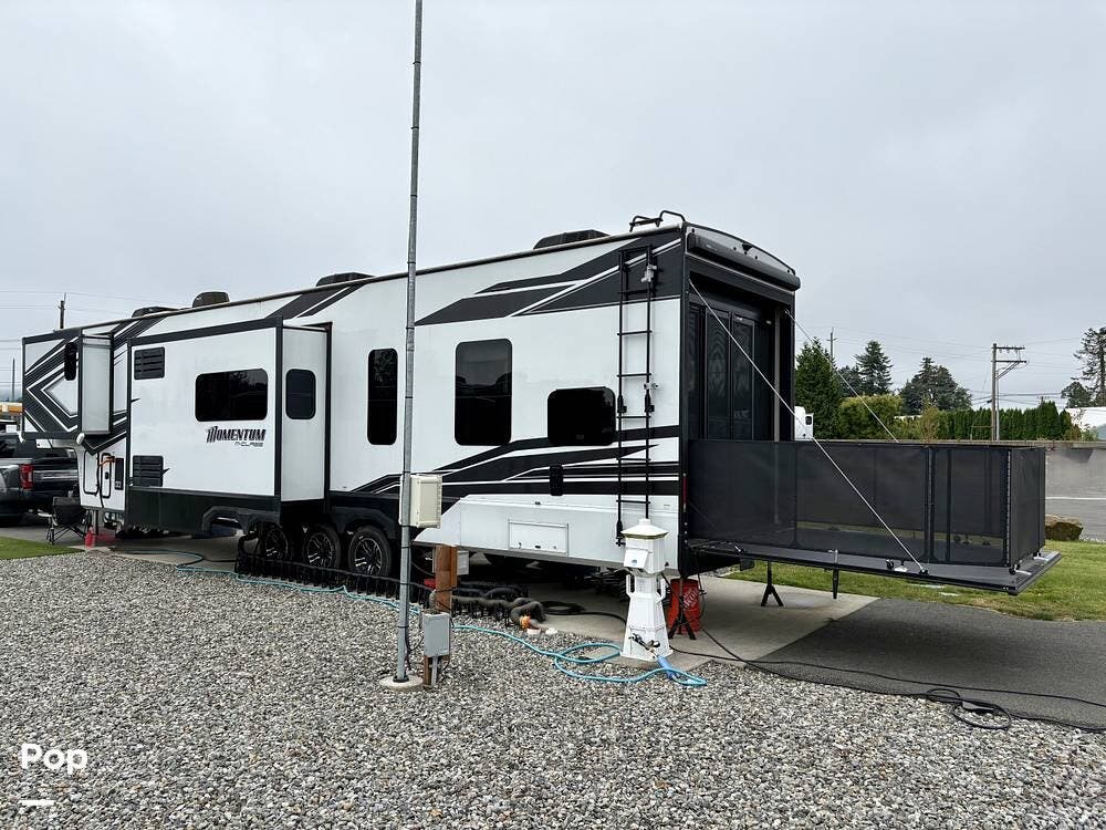 2022 Grand Design Momentum 395MS - Used Toy Hauler For Sale by Pop RVs in Sultan, Washington features Leveling Jacks, Awning, Slideout, Air Conditioning
