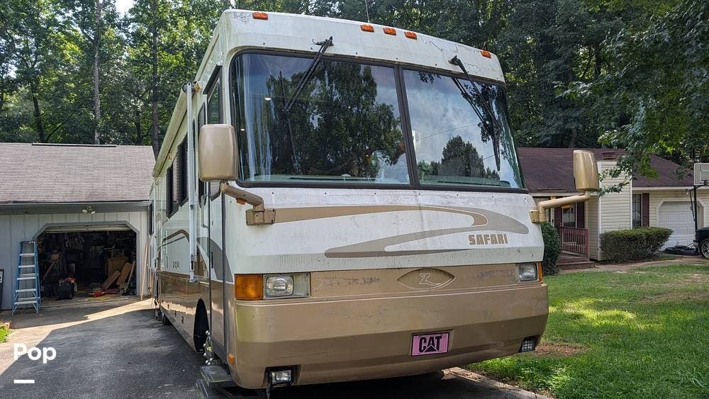 1999 Safari Zanzibar 3876 - Used Diesel Pusher For Sale by Pop RVs in Lithonia, Georgia features Awning, Slideout, Leveling Jacks
