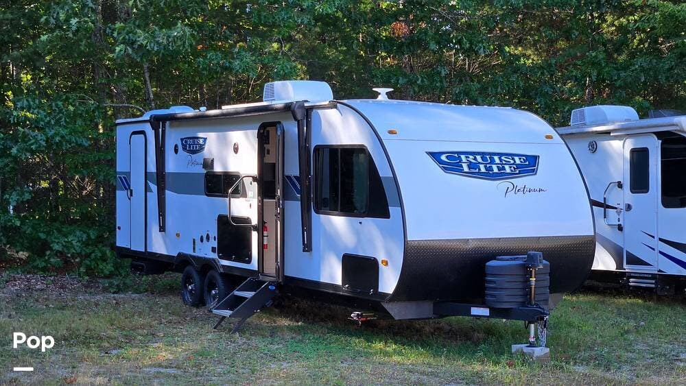 2024 Forest River Cruise Lite Platinum 263BHXL - Used Travel Trailer For Sale by Pop RVs in Windham, Maine features Leveling Jacks, Slideout, Awning, Air Conditioning