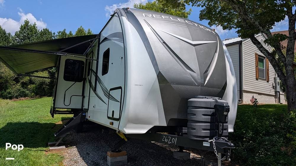 2024 Grand Design Reflection 312BHTS - Used Travel Trailer For Sale by Pop RVs in Jasper, Georgia features Leveling Jacks, Air Conditioning, Slideout, Awning