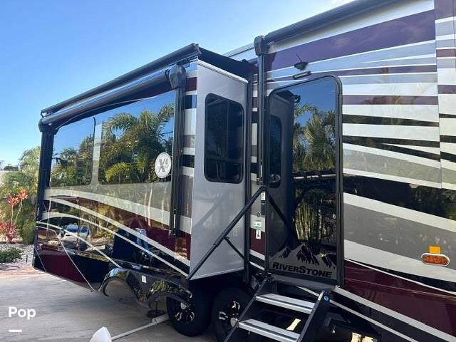 2024 Forest River RiverStone Legacy 39RKFB - Used Fifth Wheel For Sale by Pop RVs in Seminole, Florida features Slideout