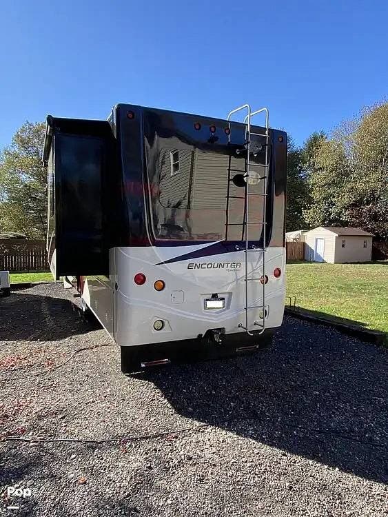 2015 Coachmen Encounter 36KS - Used Class A For Sale by Pop RVs in Hazleton, Pennsylvania features Air Conditioning, Generator, Leveling Jacks, Awning, Slideout
