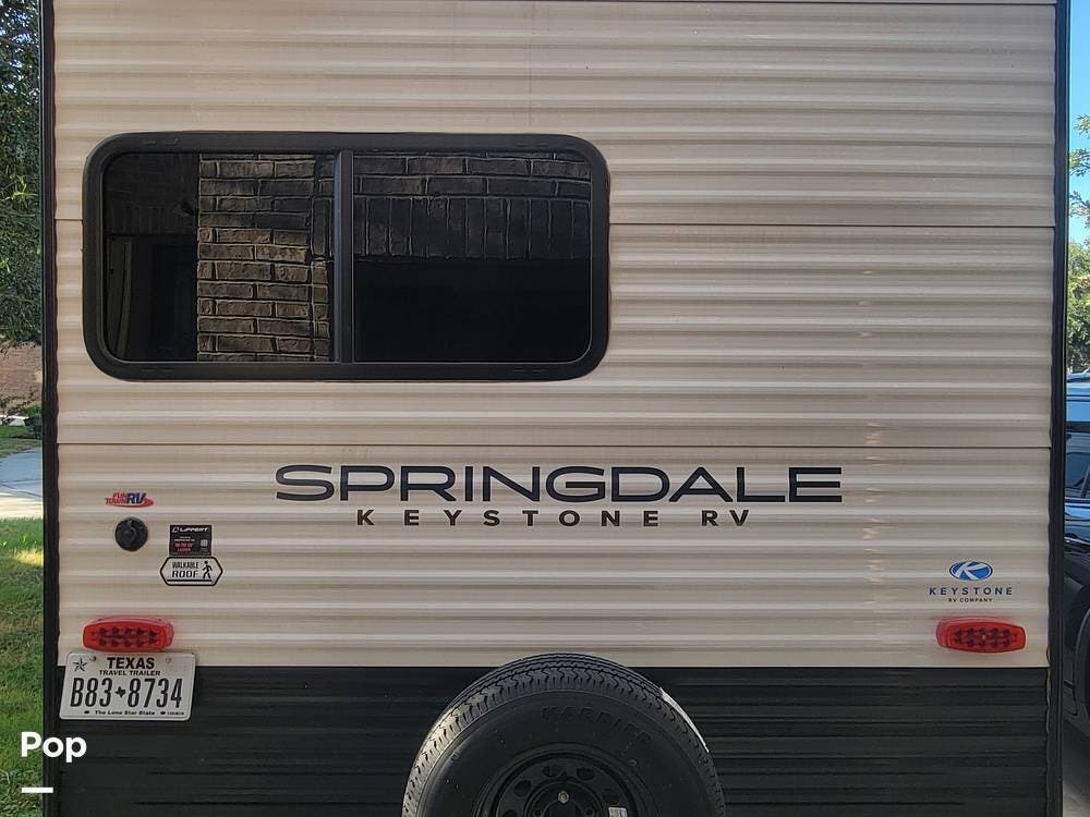 2025 Keystone Springdale 220ML - Used Travel Trailer For Sale by Pop RVs in San Antonio, Texas features Slideout