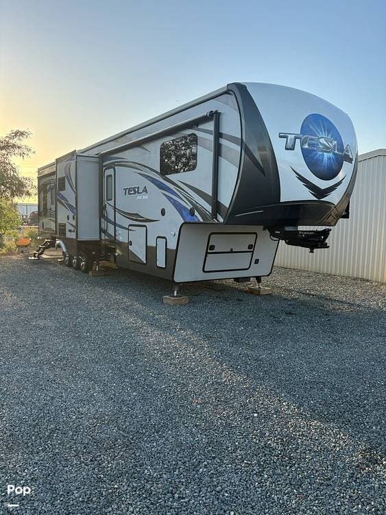 2015 Lifestyle Luxury RV Tesla T3914 - Used Toy Hauler For Sale by Pop RVs in Hanford, California features Slideout