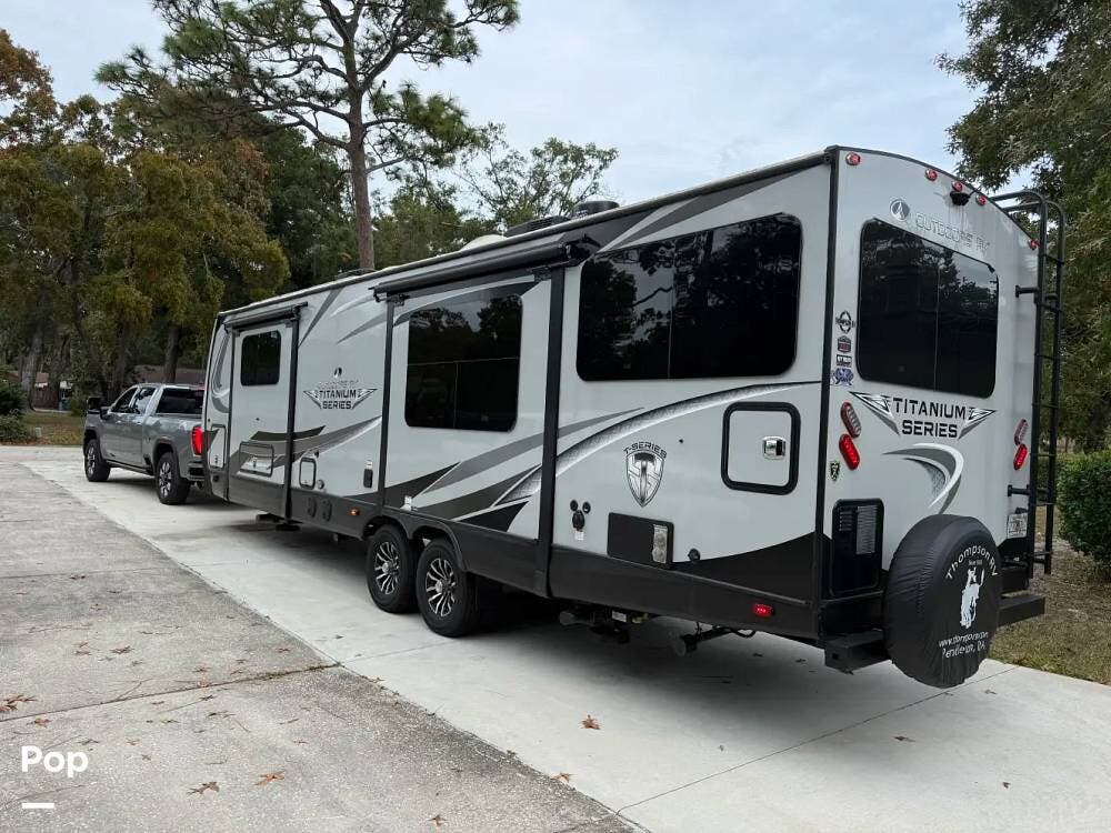 2024 Outdoors RV Blackstone Titanium Series M-280KVS - Used Travel Trailer For Sale by Pop RVs in Jacksonville, Florida features Slideout