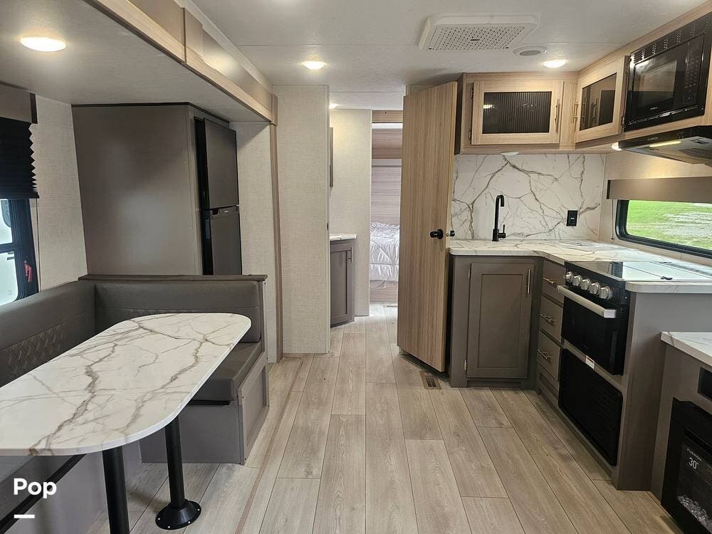 2025 K-Z Sportsmen 251RSSE - New Travel Trailer For Sale by Pop RVs in Colfax, Iowa features Awning, Slideout, Leveling Jacks, Air Conditioning