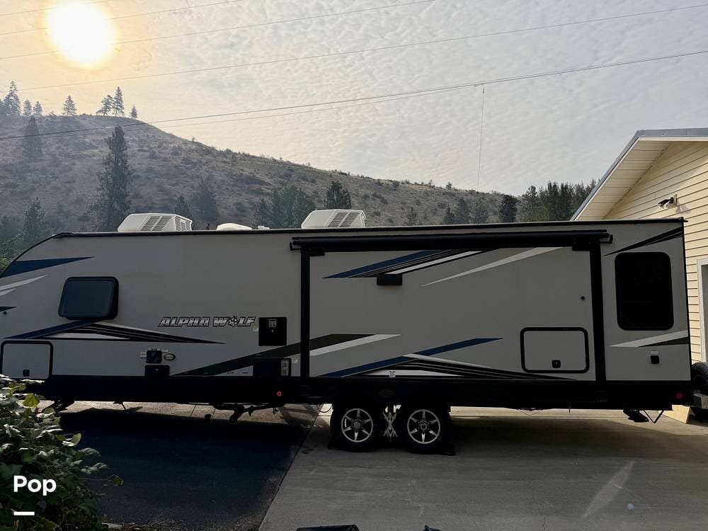 2022 Cherokee Alpha Wolf 26RL-L - Used Travel Trailer For Sale by Pop RVs in Manson, Washington features Awning, Slideout, Air Conditioning