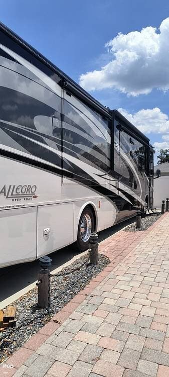 2016 Tiffin Allegro Red M-38QRA Freightliner 360hp - Used Diesel Pusher For Sale by Pop RVs in Mulberry, Florida features Slideout
