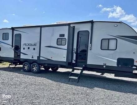 2022 Forest River Vengeance Rogue 32V - Used Travel Trailer For Sale by Pop RVs in Rincon, Georgia features Slideout