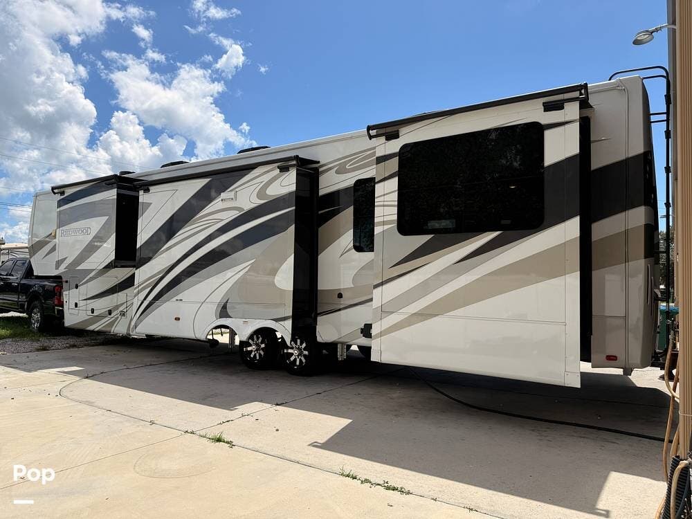 2022 CrossRoads Redwood 4150RD - Used Fifth Wheel For Sale by Pop RVs in Largo, Florida features Air Conditioning, Slideout, Leveling Jacks, Awning