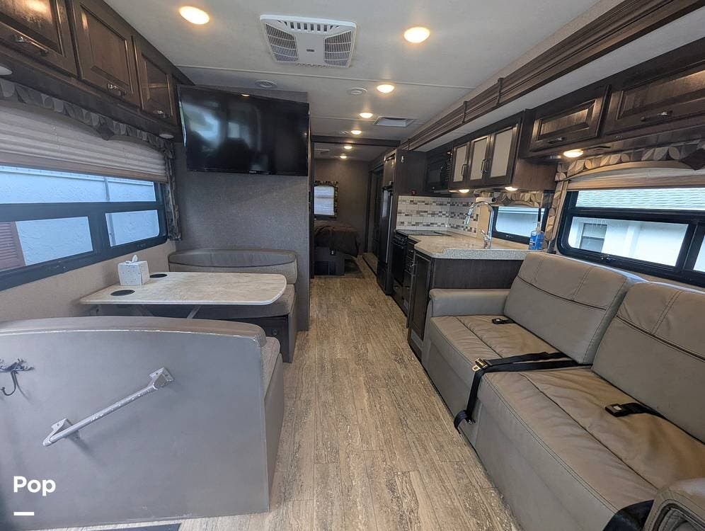 2018 Thor Motor Coach Hurricane 29M - Used Class A For Sale by Pop RVs in Sun City Center, Florida features Awning, Leveling Jacks, Generator, Air Conditioning, Slideout