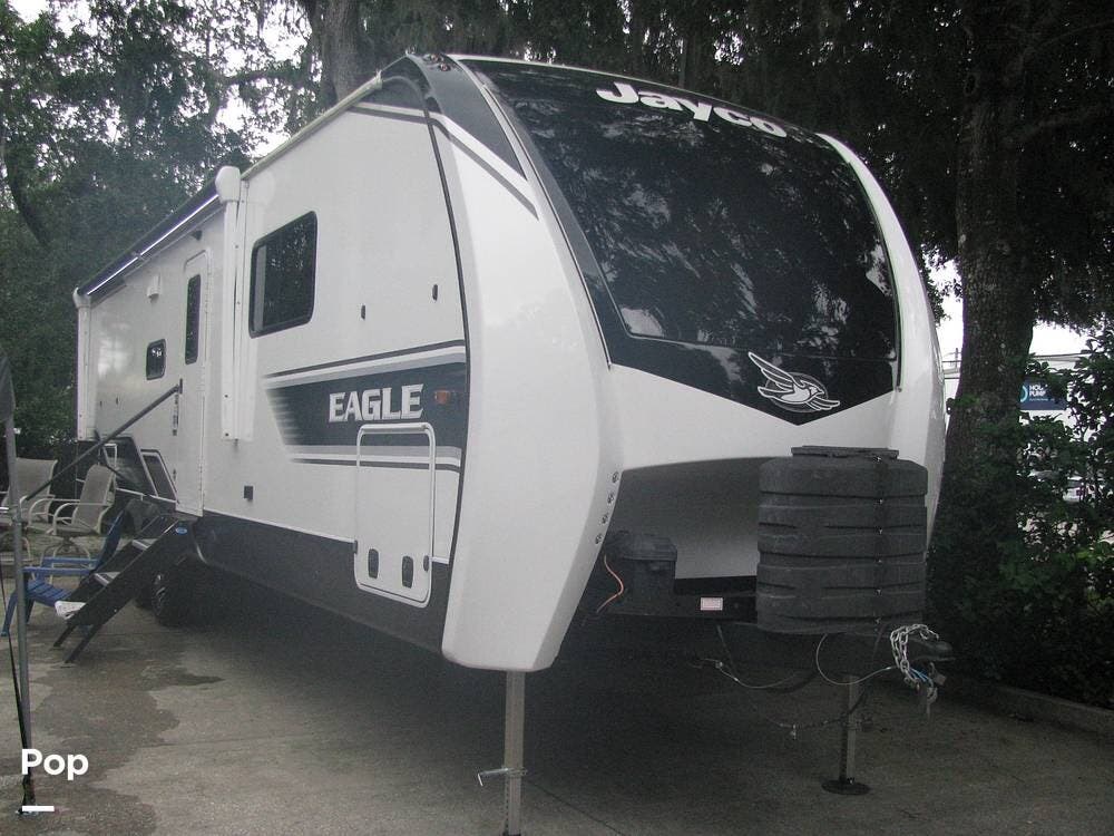 2024 Jayco Eagle 320FBOK - Used Travel Trailer For Sale by Pop RVs in Edgewater, Florida features Slideout, Air Conditioning, Leveling Jacks, Awning