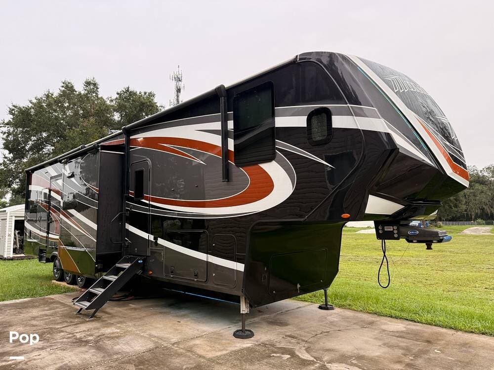 2022 Grand Design Momentum 399TH-R - Used Toy Hauler For Sale by Pop RVs in Thonotosassa, Florida features Leveling Jacks, Air Conditioning, Slideout, Awning