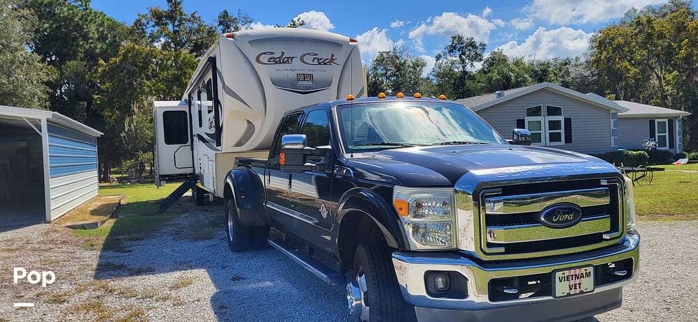 2018 Forest River Cedar Creek 35IK - Used Fifth Wheel For Sale by Pop RVs in Homosassa, Florida features Slideout, Awning, Air Conditioning, Leveling Jacks