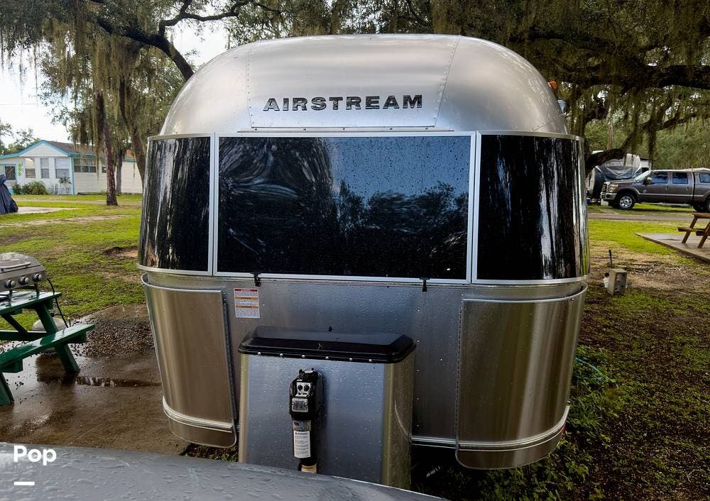 2025 Airstream Caravel 22FB - Used Travel Trailer For Sale by Pop RVs in Avon Park, Florida features Awning, Leveling Jacks, Air Conditioning