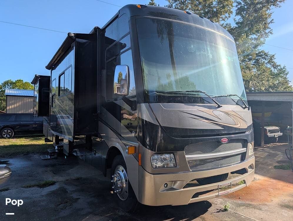 2012 Winnebago Adventurer 37F - Used Class A For Sale by Pop RVs in Osteen, Florida features Leveling Jacks, Air Conditioning, Awning, Slideout, Generator