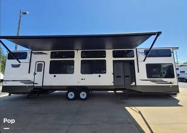 2023 Forest River Wildwood Grand Lodge 42DL - Used Travel Trailer For Sale by Pop RVs in Glenburn, Maine features Slideout