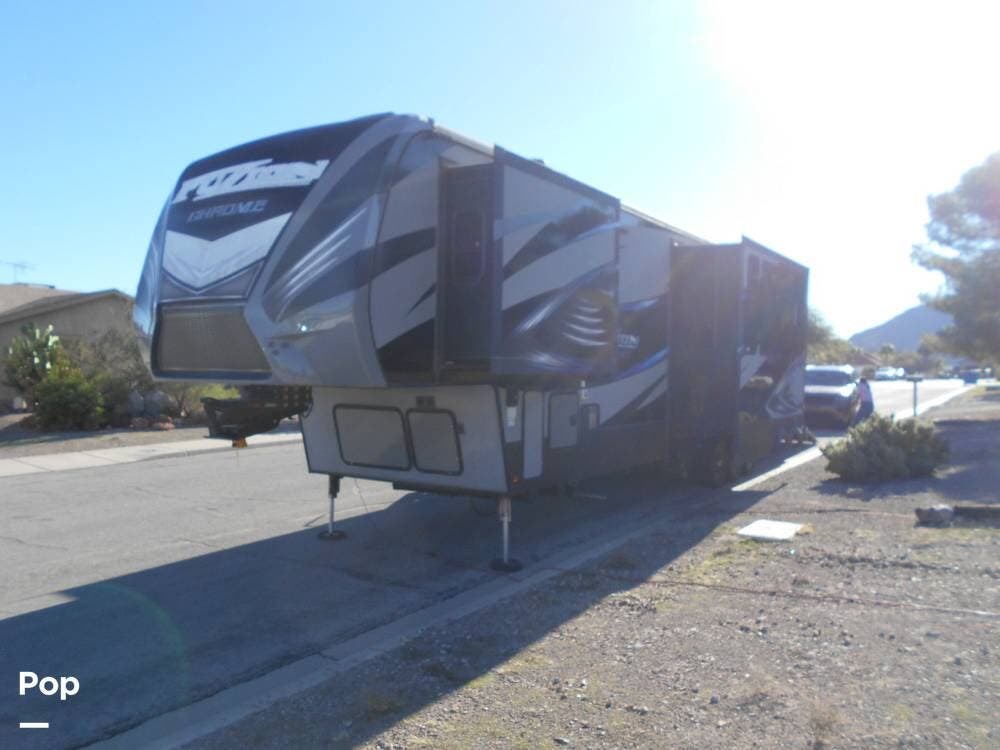 2015 Keystone Fuzion Chrome 403 - Used Toy Hauler For Sale by Pop RVs in Henderson, Nevada features Generator, Leveling Jacks, Awning, Slideout, Air Conditioning