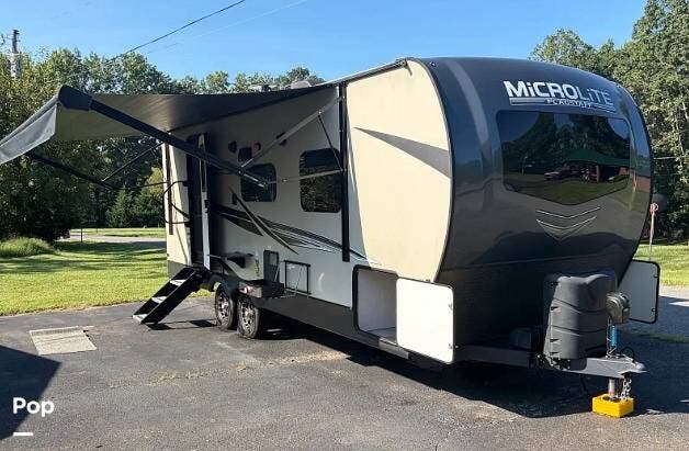 2022 Forest River Flagstaff Micro Lite 25FBLS - Used Travel Trailer For Sale by Pop RVs in Appomattox, Virginia features Air Conditioning, Slideout, Awning
