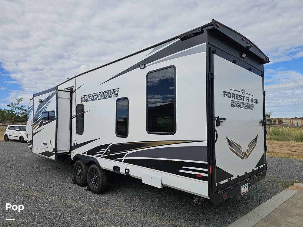 2025 Forest River Shockwave 2900RLS - Used Toy Hauler For Sale by Pop RVs in Prescott Valley, Arizona features Leveling Jacks, Air Conditioning, Awning, Slideout, Generator