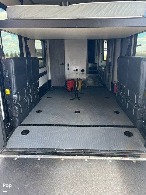 2021 Keystone Carbon 358 - Used Toy Hauler For Sale by Pop RVs in Bottineau, North Dakota features Slideout