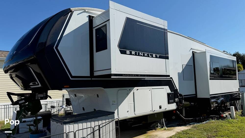 2025 Miscellaneous Brinkley Z 3300 - Used Fifth Wheel For Sale by Pop RVs in North Fort Myers, Florida features Air Conditioning, Slideout, Leveling Jacks, Awning
