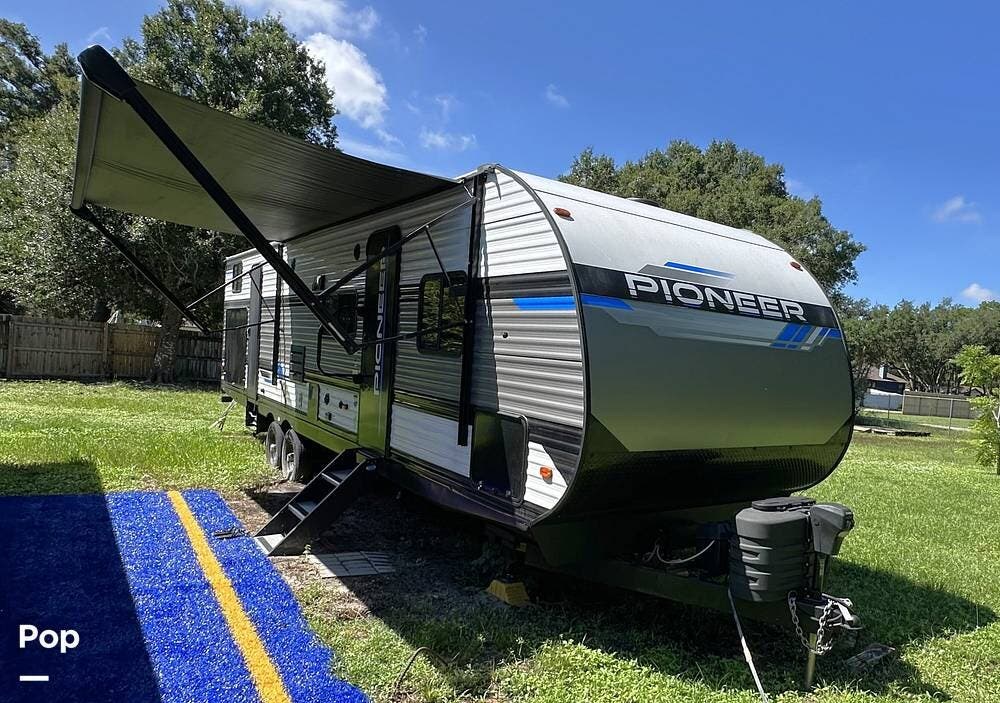 2024 Heartland Pioneer Heartland  DS 320 - Used Travel Trailer For Sale by Pop RVs in Bradenton, Florida features Slideout